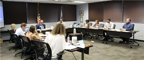 Board members sitting at a table